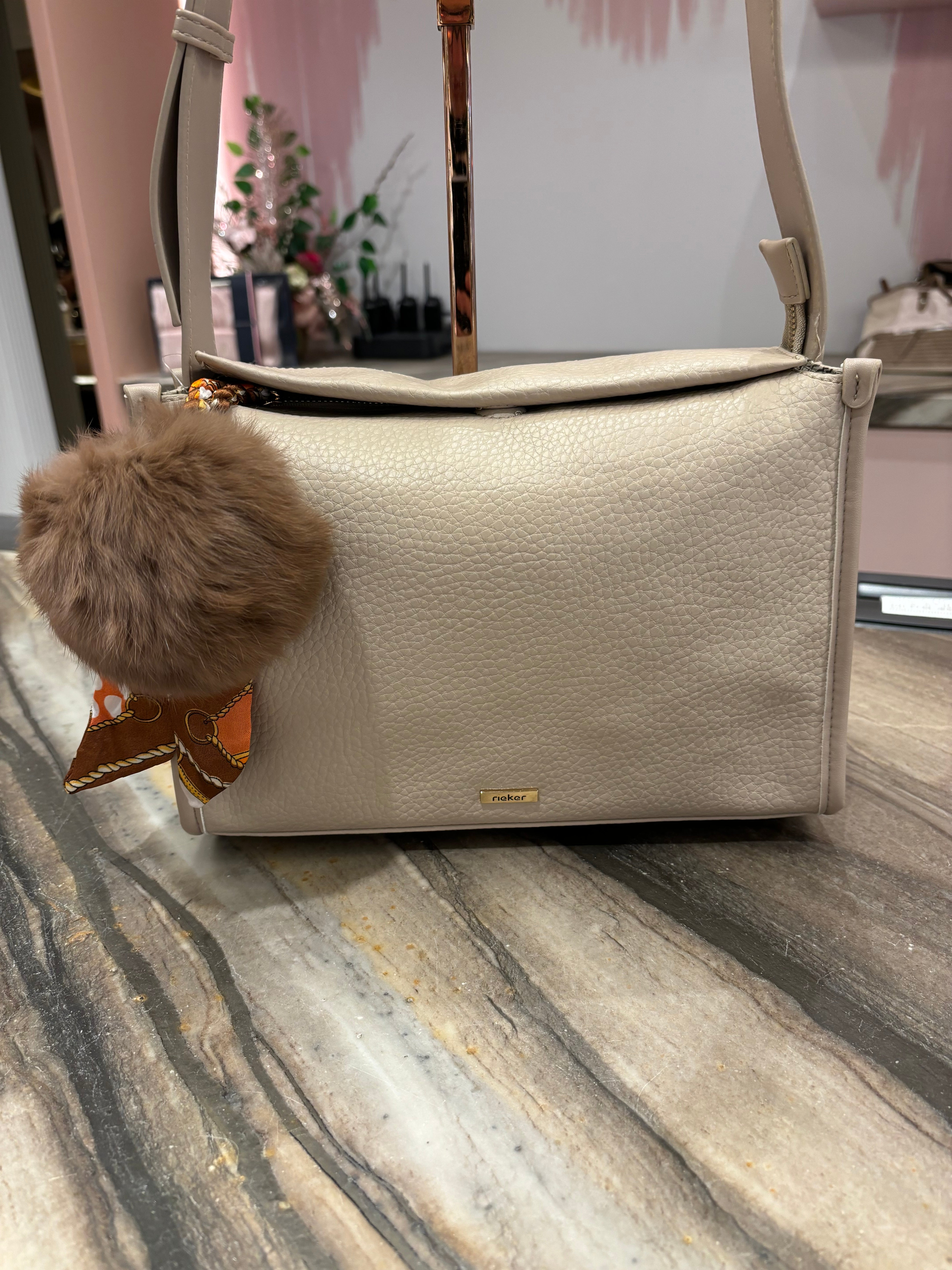 Rieker AW24 Crossbody Bag with Pom Pom and Scarf Detail H1656 60 Beige