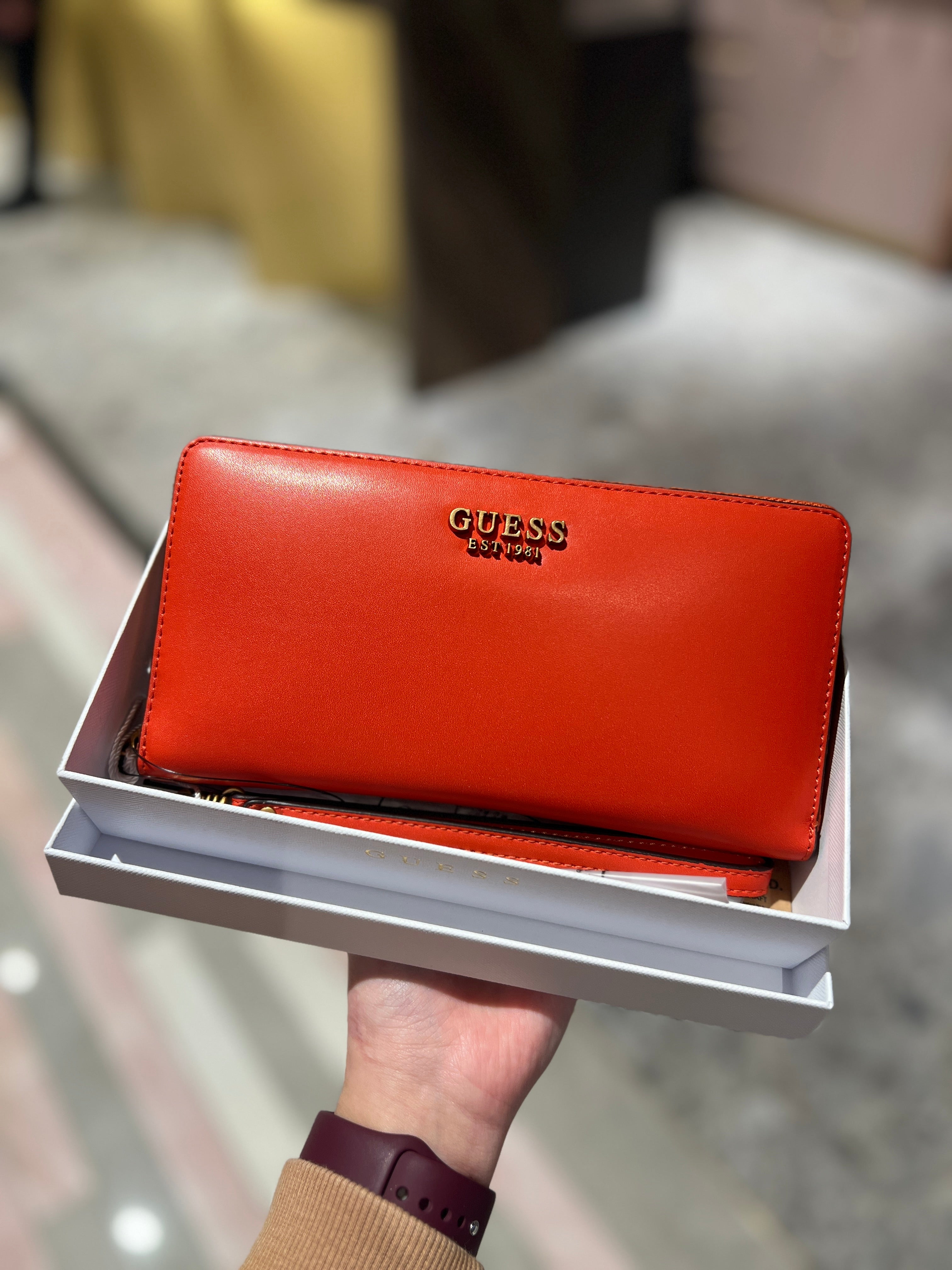 Orange on sale guess purse